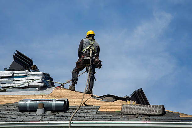Professional Roof Replacement technician working in De Mossville, KY
